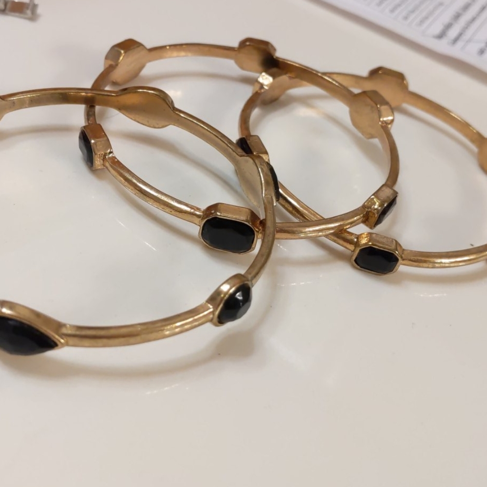 Gold and black bangles
